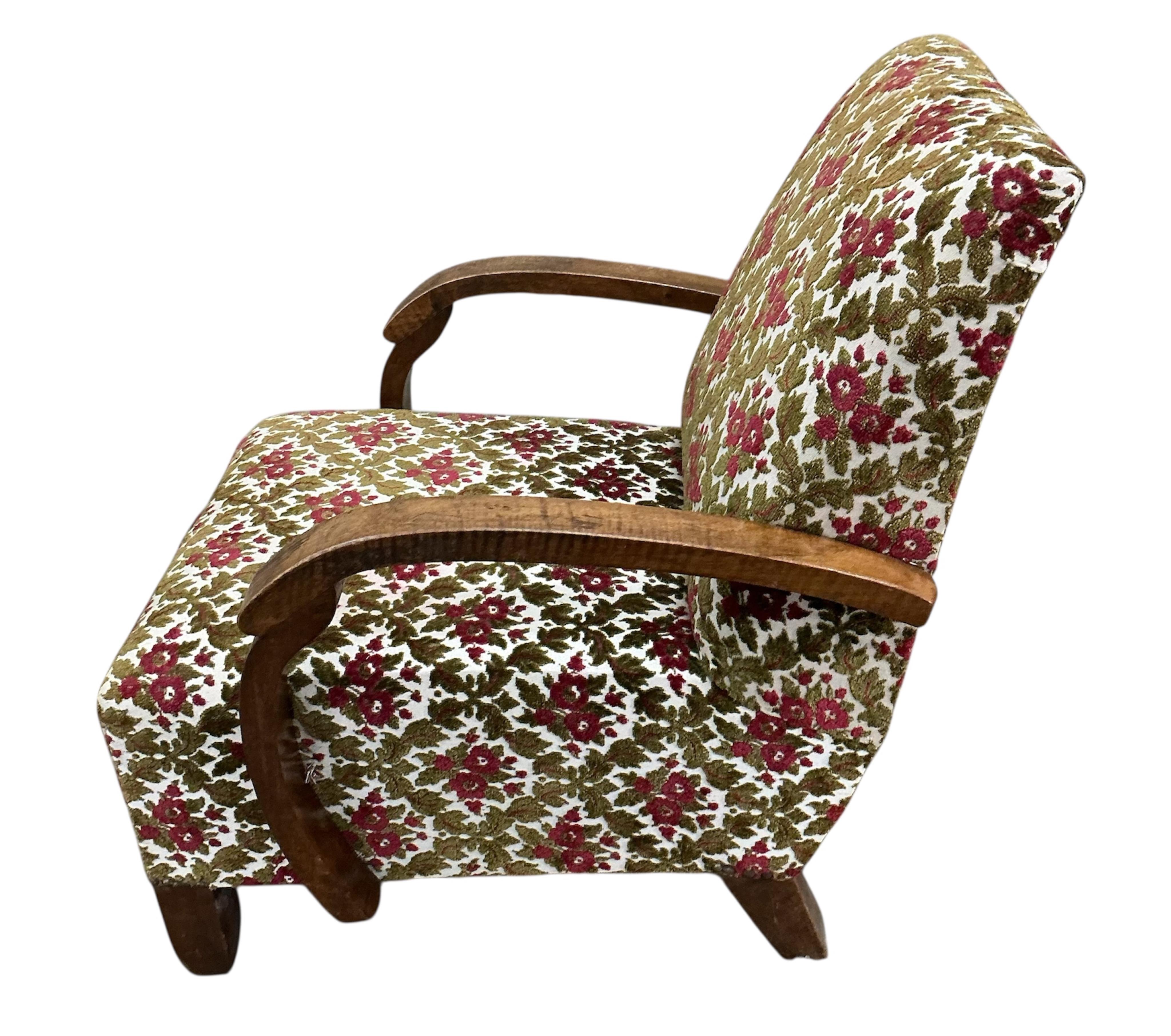 A pair of French Art Deco walnut armchairs, width 65cm, depth 74cm, height 80cm